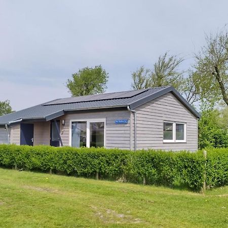 Het Dobbertje, charmant houten huisje Sint Maartensvlotbrug Buitenkant foto