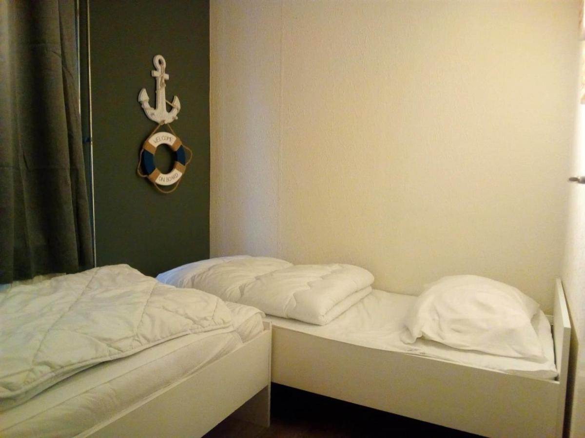 Het Dobbertje, charmant houten huisje Sint Maartensvlotbrug Buitenkant foto